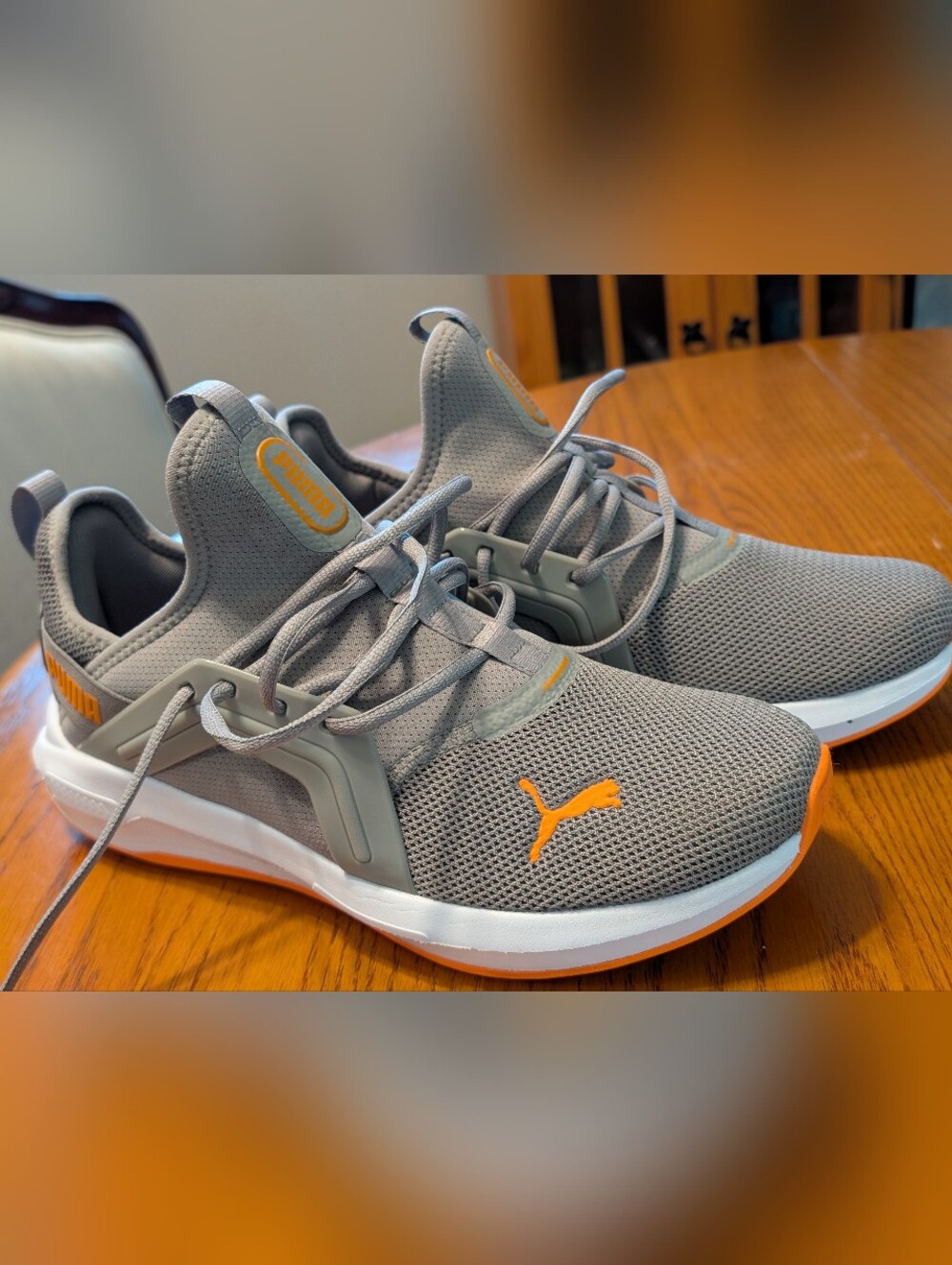 Men's Puma Softride Gray Sneakers with Orange Accents. Size 10.